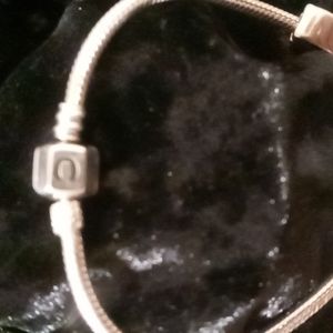 Pandora bracelet charms not included marked 925 .